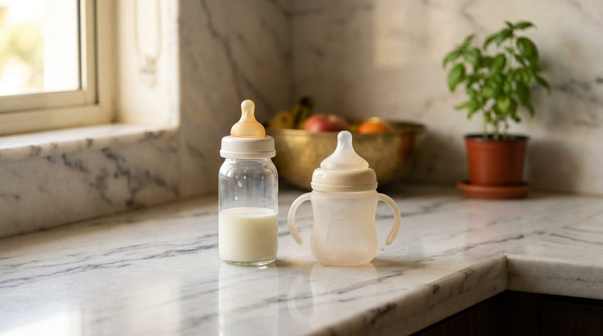 Glass baby bottle next to a silicone baby bottle compared side by side