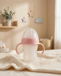 SafeKido Anti-Colic Transparent Silicone Bottle in Pink — soft silicone with anti-colic valve and handles, 250 ml